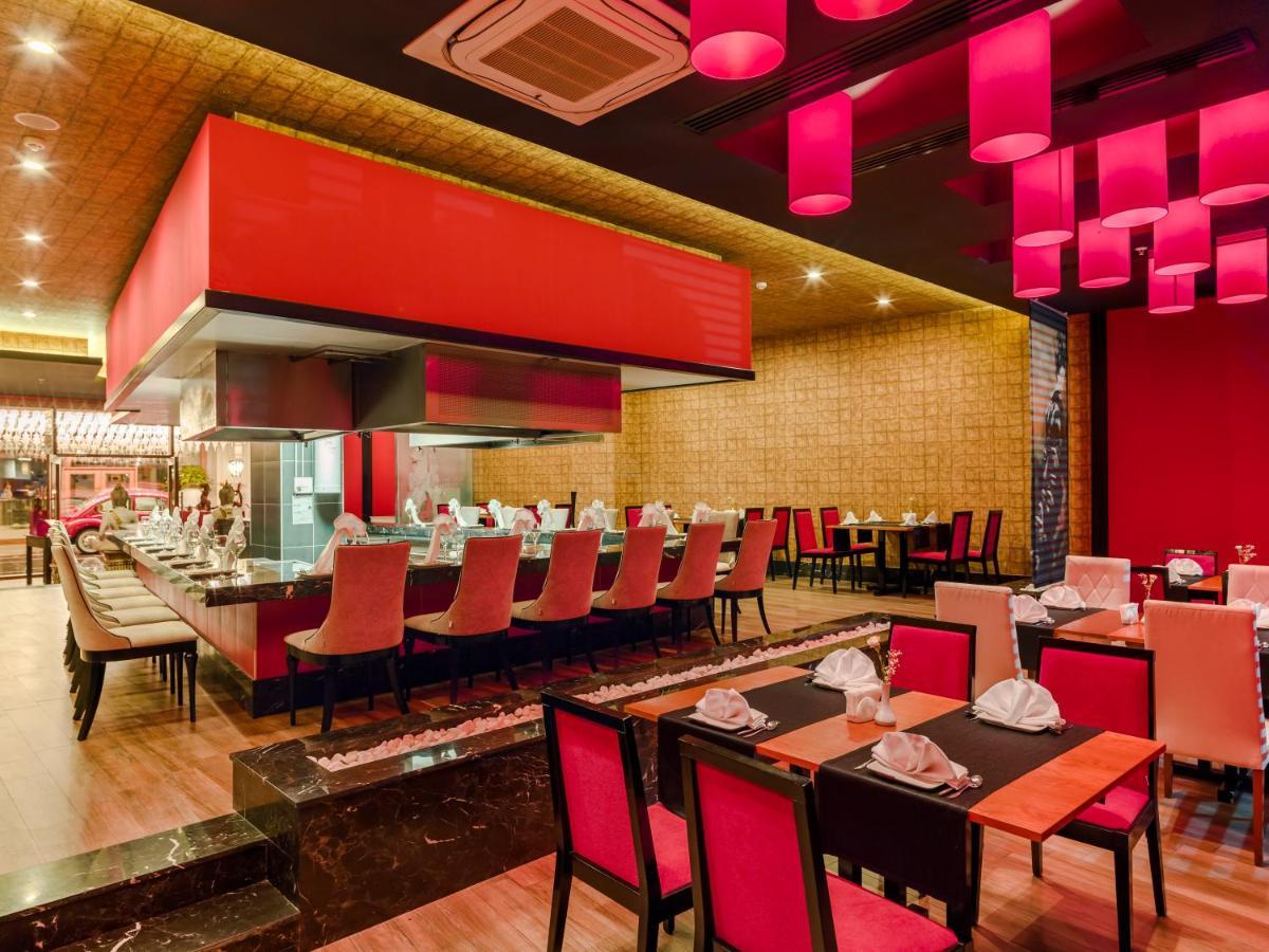 Tui Magic Life Jacaranda Hotel Side Luaran gambar The restaurant